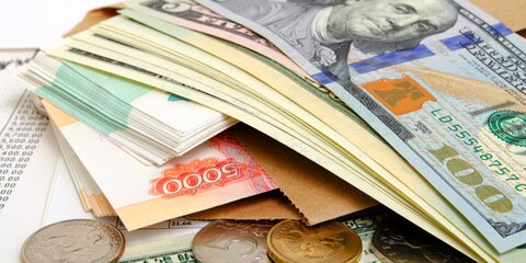 ЦБ повысил официальный курс доллара и евро