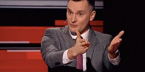 Российский журналист бросил стакан в польского политолога в прямом эфире