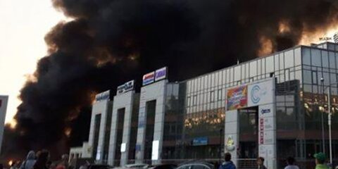 Открытое горение в автоцентре Кемерова ликвидировано