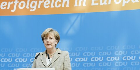 Блок Меркель побеждает на выборах в Европарламент в Германии